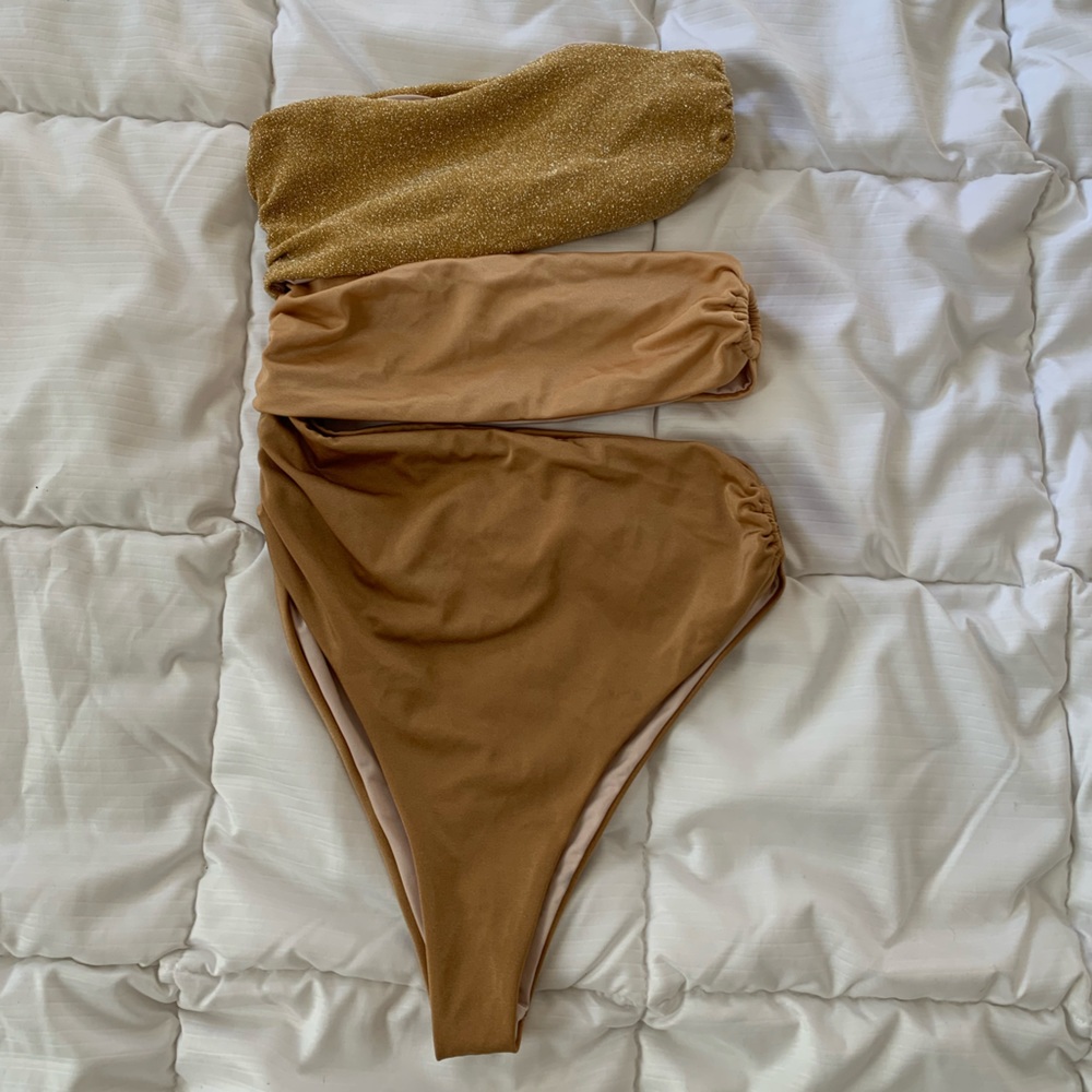 Baobab one piece gold glitter swimsuit with a skirt coverup